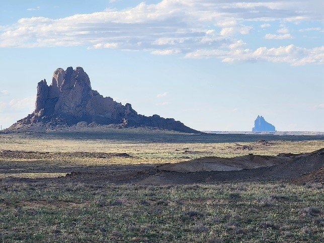 A picture containing sky, outdoor, landscape, cloudDescription automatically generated